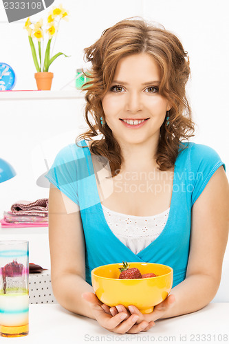 Image of beautiful woman in the kitchen