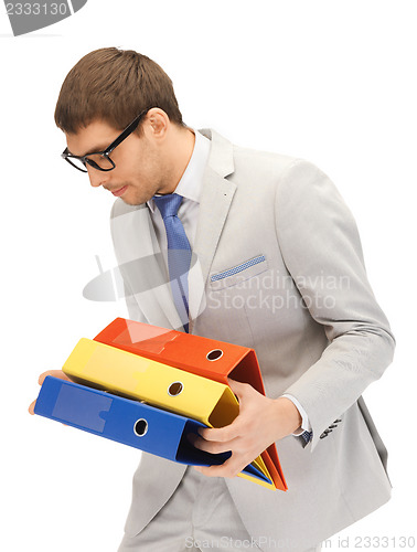 Image of man with folders