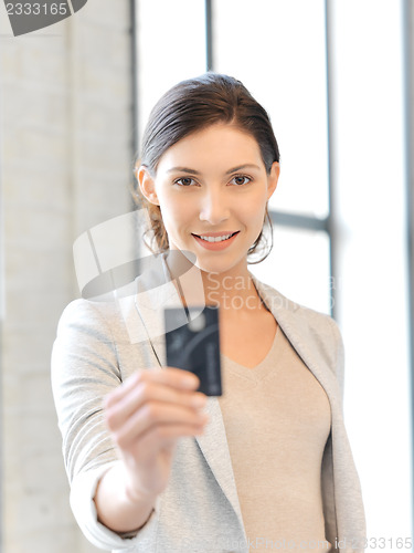 Image of happy woman with credit card