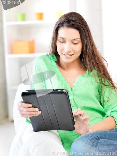 Image of happy woman with tablet pc computer