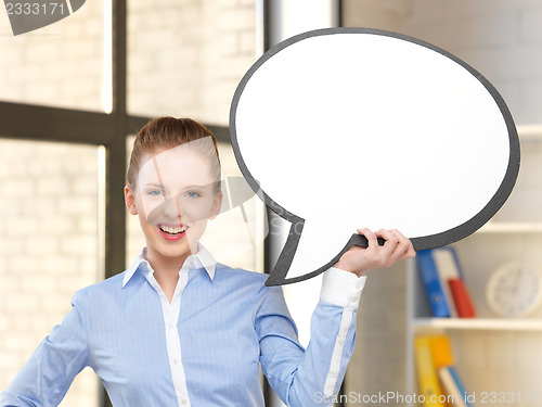 Image of smiling businesswoman with blank text bubble