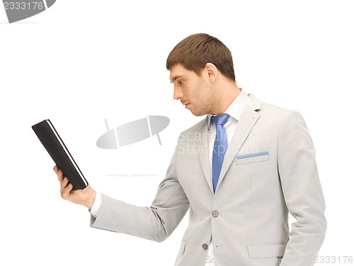 Image of calm man with tablet pc computer