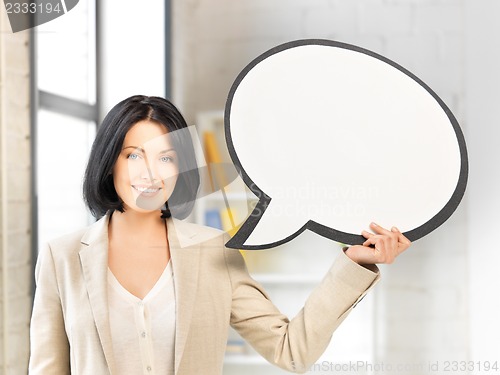 Image of smiling businesswoman with blank text bubble