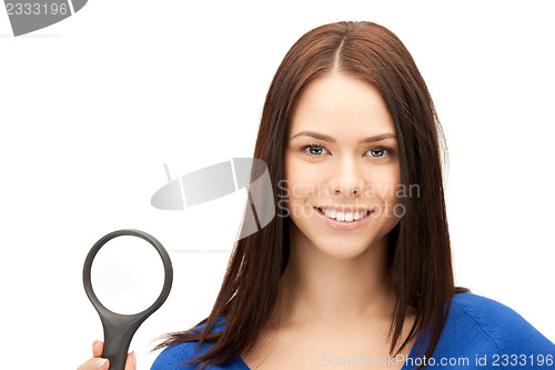 Image of woman with magnifying glass