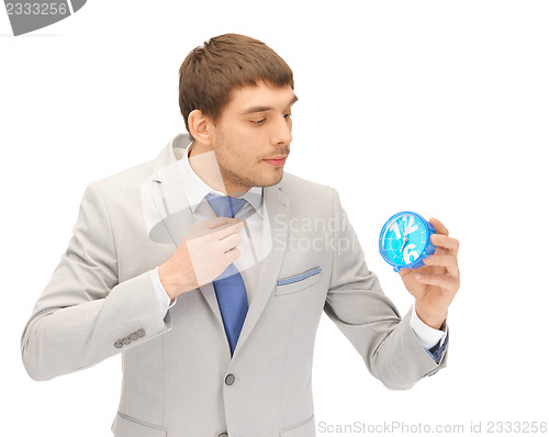 Image of man with clock