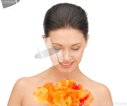 Image of lovely woman with red flowers