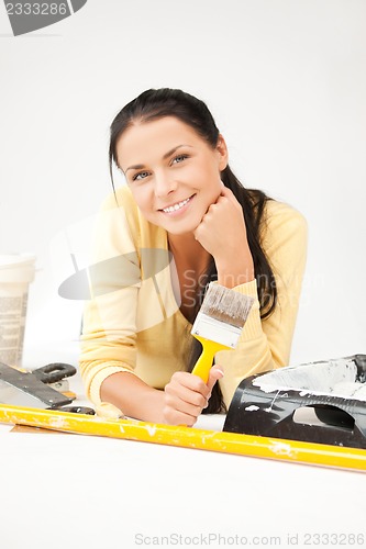 Image of lovely housewife painting