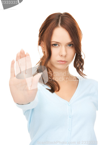 Image of woman making stop gesture