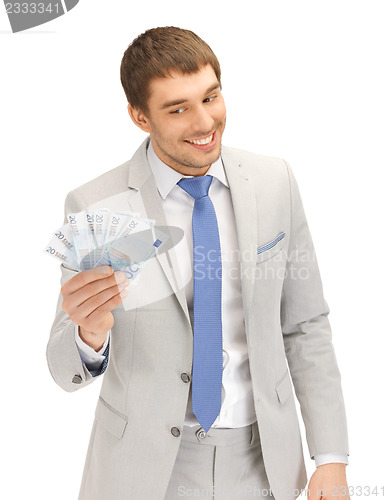 Image of handsome man with euro cash money