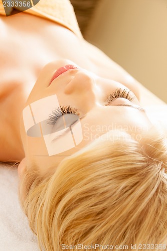 Image of beautiful woman in spa salon