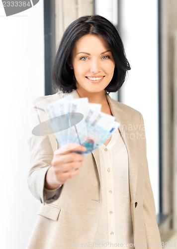 Image of lovely woman with euro cash money