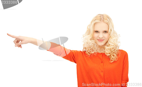 Image of attractive student pointing her finger
