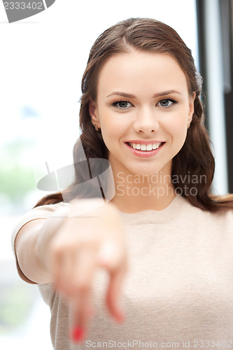 Image of businesswoman pointing her finger