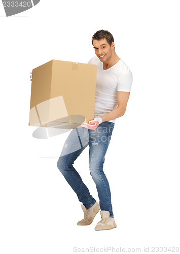 Image of handsome man with big box