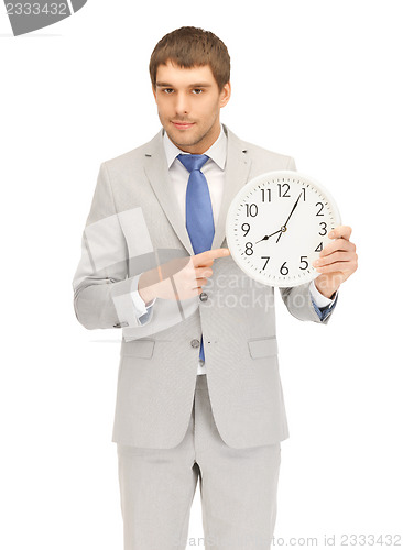 Image of man with clock