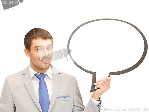 Image of smiling businessman with blank text bubble