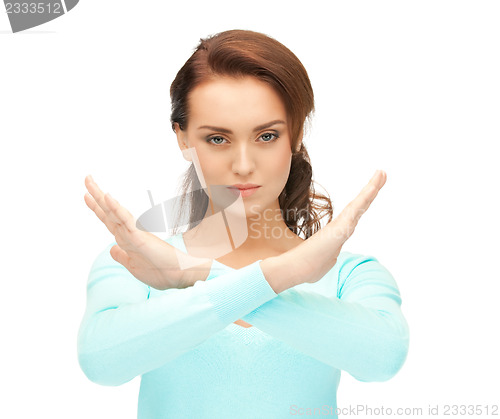 Image of woman making stop gesture