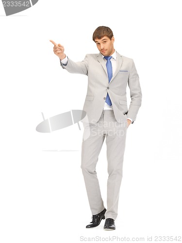 Image of businessman pointing his finger