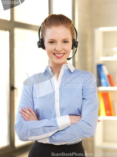 Image of friendly female helpline operator
