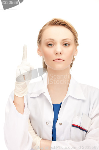 Image of female doctor with her finger up
