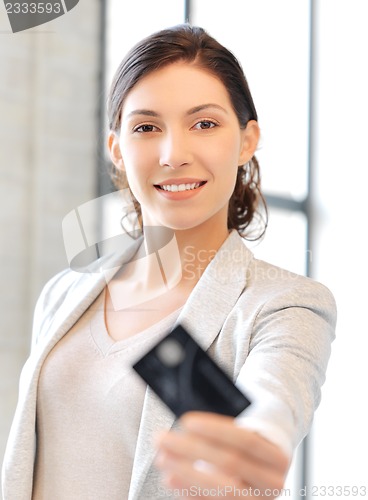 Image of happy woman with credit card