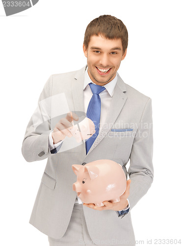 Image of man with piggy bank