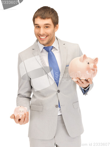 Image of man with piggy bank