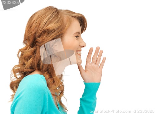 Image of teenage girl whispering gossip