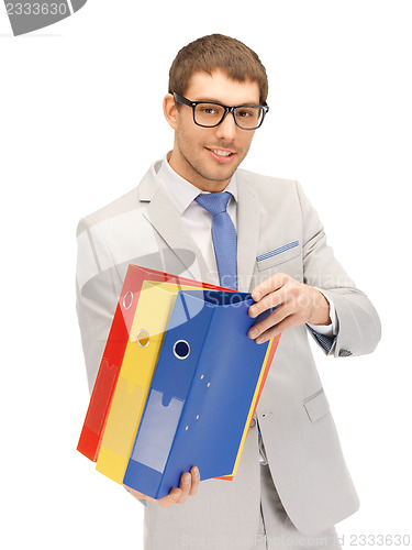 Image of man with folders