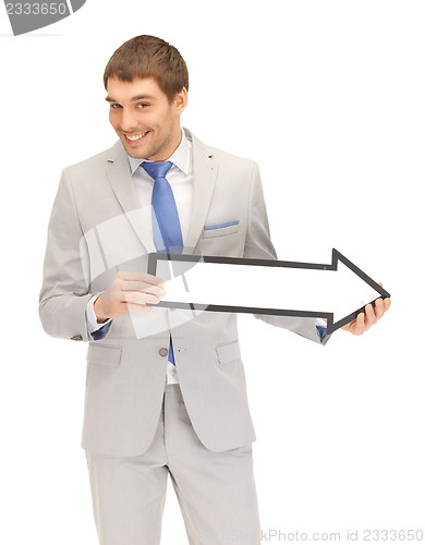 Image of businessman with direction arrow sign