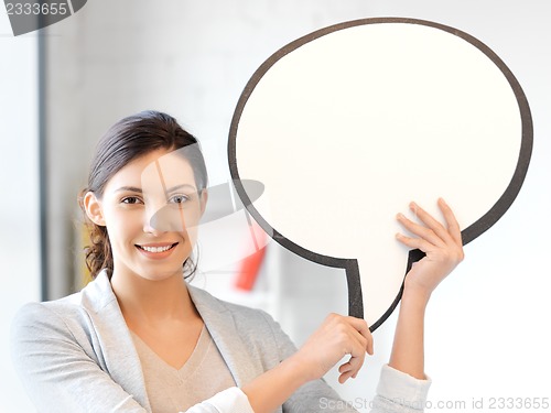 Image of smiling businesswoman with blank text bubble