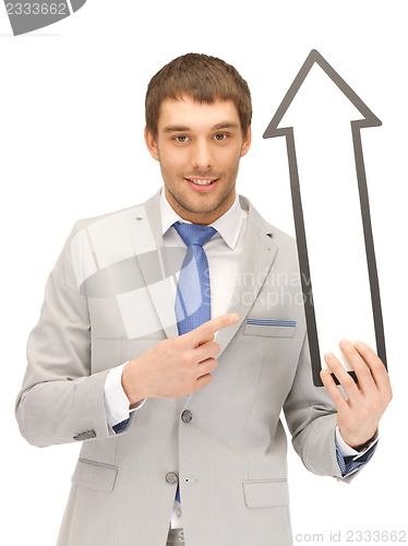 Image of businessman with direction arrow sign