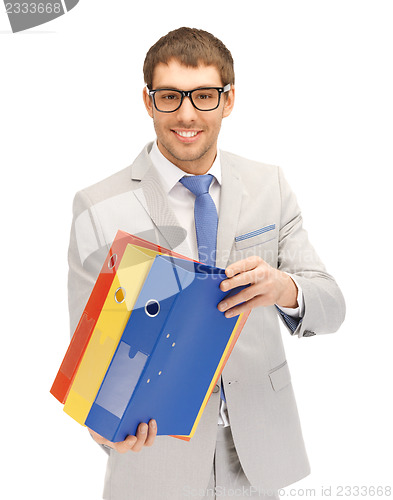 Image of man with folders