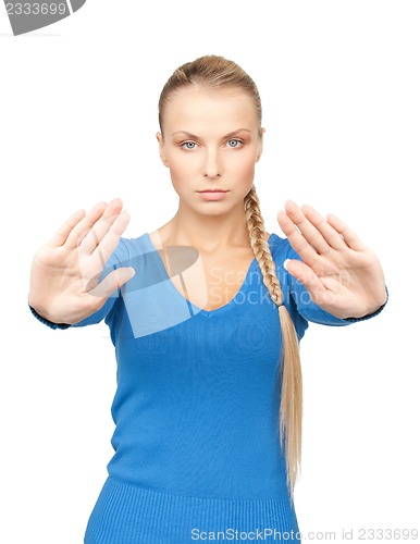 Image of woman making stop gesture