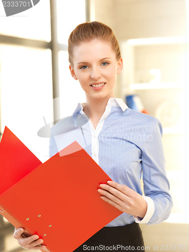 Image of beautiful woman with folder