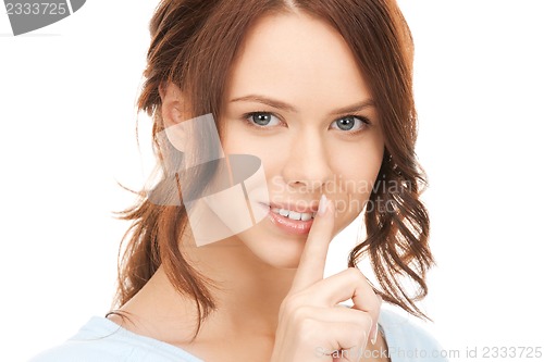 Image of finger on lips