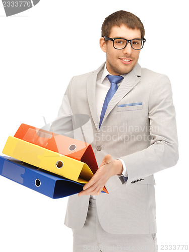 Image of man with folders