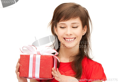 Image of happy teenage girl with gift box