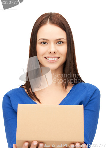 Image of attractive businesswoman with cardboard box