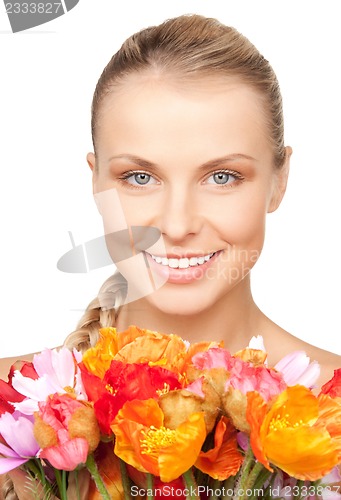 Image of lovely woman with red flowers