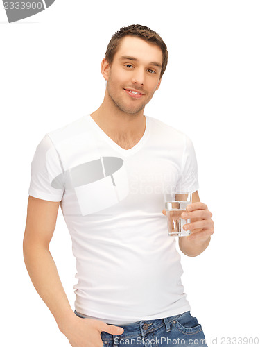 Image of man in white shirt with glass of water