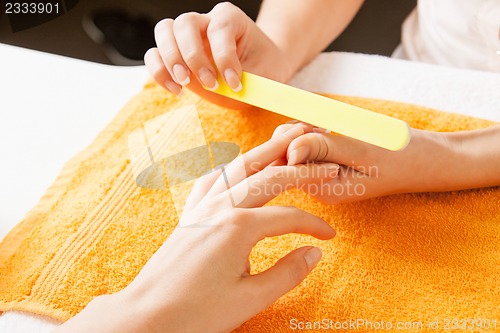 Image of manicure process on female hands