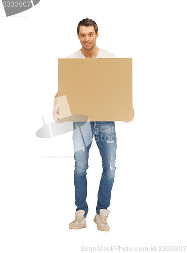 Image of handsome man with big box