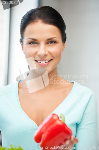 Image of beautiful woman in the kitchen