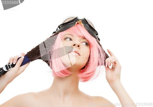 Image of pink hair girl in aviator helmet