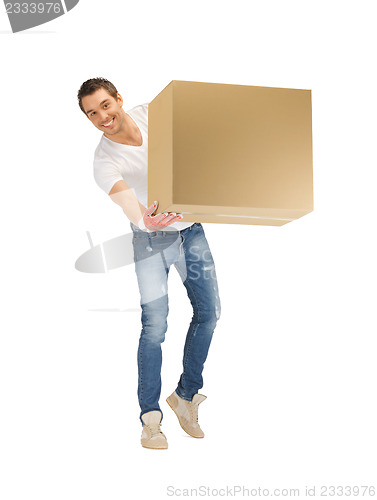 Image of handsome man with big box