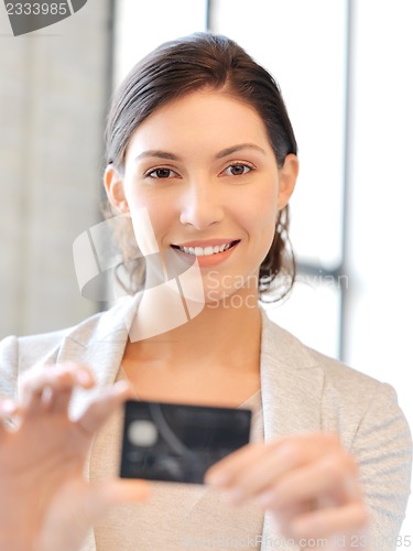 Image of happy woman with credit card