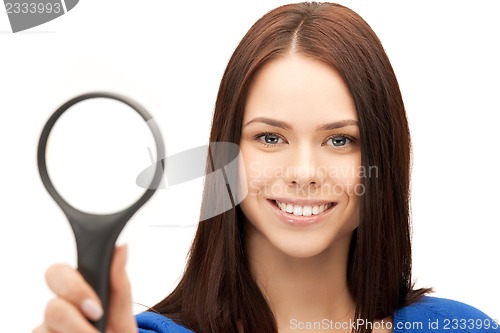 Image of woman with magnifying glass