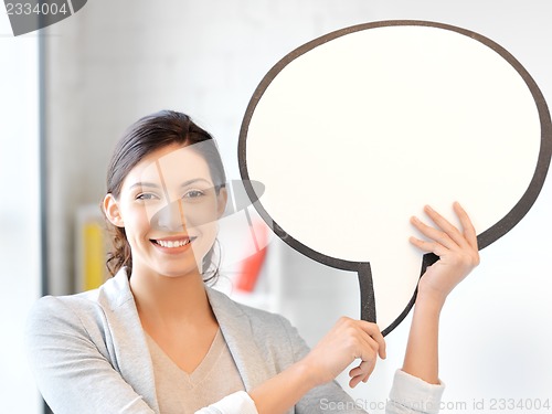 Image of smiling businesswoman with blank text bubble
