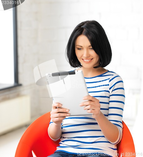 Image of happy teenage girl with tablet pc computer